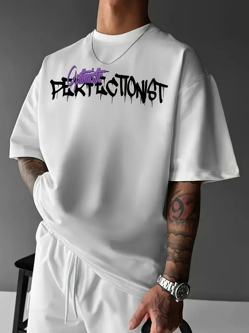 Perfectionist™ – Camiseta oversize negra con gráfico urbano